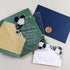 rustic navy blue and ivory floral acrylic clear wedding invites with gold glittery envelope