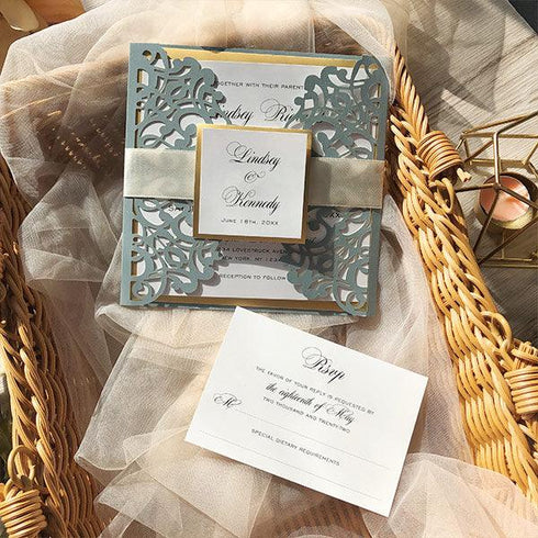 elegant dusty blue and ivory laser cut wedding invitations with gold liner CWIL85