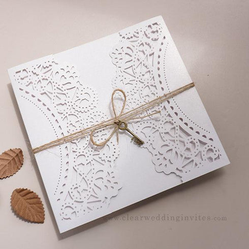 elegant rustic laser cut wedding invitations with tag and twine CWIL75