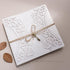 elegant rustic laser cut wedding invitations with tag and twine CWIL75