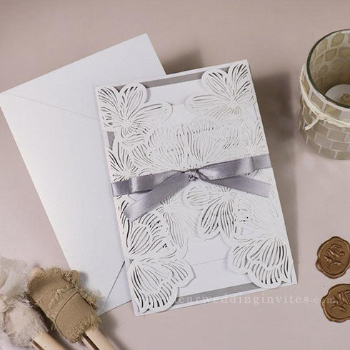 elegant white laser cut wedding invitations with silver gray ribbon CWIL36