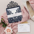 navy blue laser cut wedding invitation with blush pink belly band CWIL09