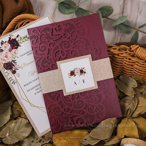 burgundy laser cut pocket fold and burgundy floral wedding invitations with glittery belly band CWIL07